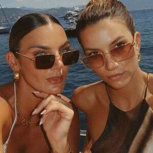 Two Pairs of Twisted Frame Brown & Black Sunglasses